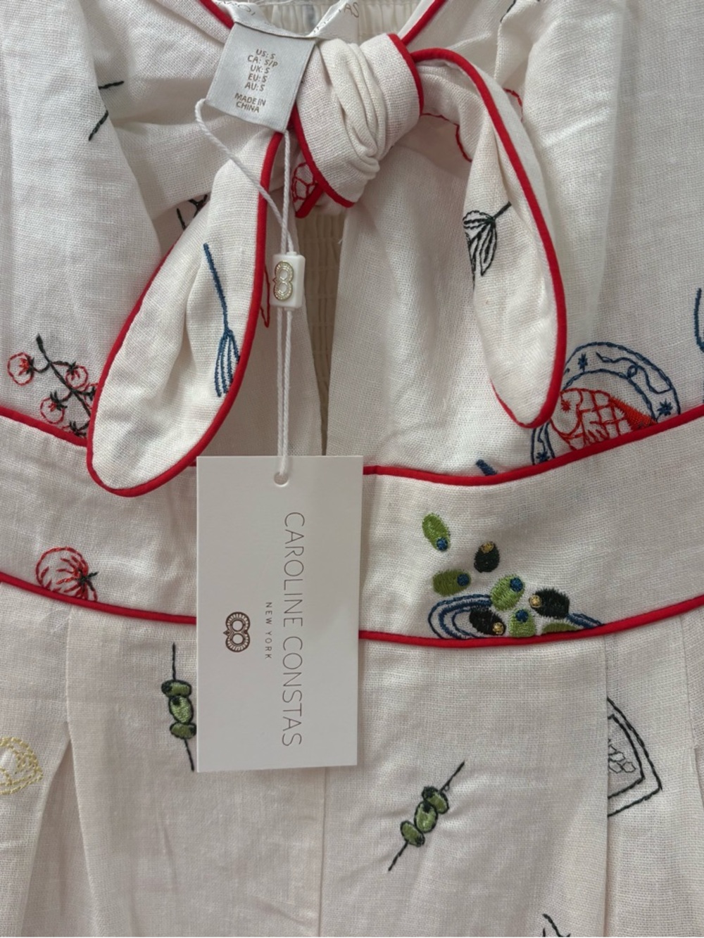 NWT Caroline Constas White Romper
embroidered size small - Picture 10 of 11
